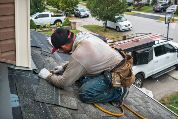 Professional Roofing technician working in Burlingame, CA
